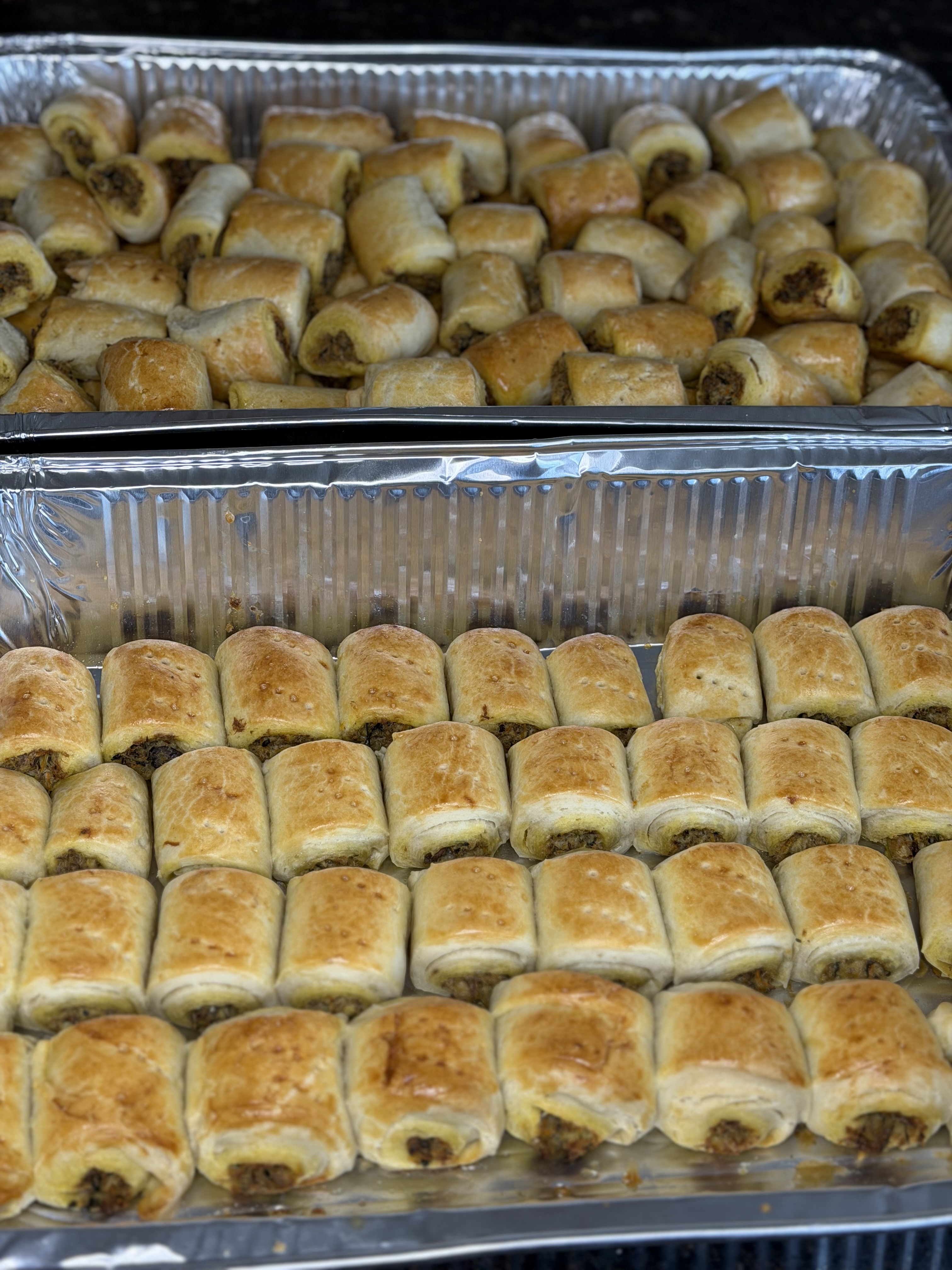Trays of golden fish rolls